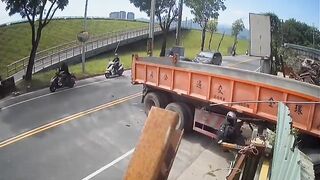Speeding Motorcyclist becomes One with Truck....Dangles only by his Helmet and Dies there