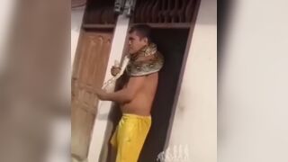 Snake Slowly Choking Man to Asphyxiation