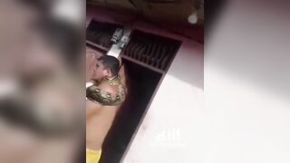 Snake Slowly Choking Man to Asphyxiation