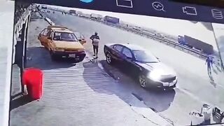 Man Unloading Car is Killed Instantly