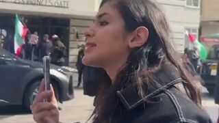 Iranian woman goes nuclear on a white liberal supporting a Terr*rist Regime
