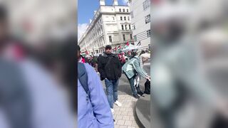 Iranian woman goes nuclear on a white liberal supporting a Terr*rist Regime