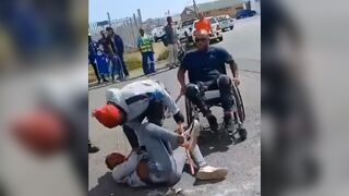 Man Badly Beaten with Metal Pipes, even the Man in the Wheelchair gets his Licks In