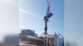 True Nightmare: Girl Dangles out of Park Amusement Ride....