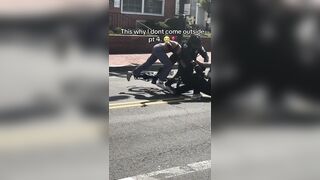 Two black women are fighting when out of nowhere a police officer on a bicycle comes and RAMS into them