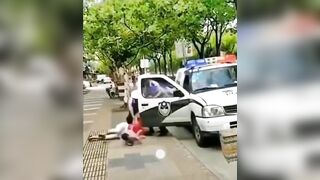Police Body Slam Woman with Her Baby in her Arms