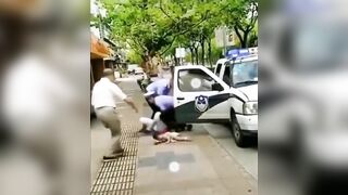 Police Body Slam Woman with Her Baby in her Arms