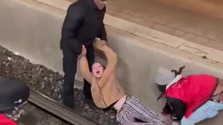 Depressed woman saved from suicide under train