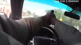 Bad Ass Cop Empties his Entire Magazine through his Cruiser Window..Killing Perp