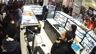 Police use pepper spray to break up a brawl between 50 mainly African teenagers at a Melbourne shopping centre