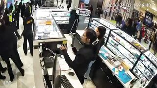 Police use pepper spray to break up a brawl between 50 mainly African teenagers at a Melbourne shopping centre