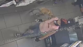 An armed robbery suspect behind the counter of a 7-11 pulled out a handgunb and gets fatally shot by LAPD officers