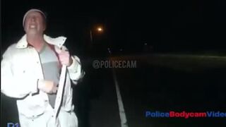 He Pulled a Gun out of his Jacket while Talking with an Officer (Looks Possessed)