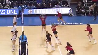 College Female Volleyball Player Dives into a Table to make the Save, for the Win