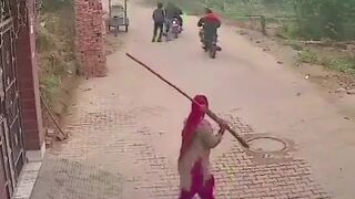 4 Trigger Happy Gangsters are Scared Off by Woman with Broom Stick