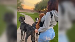 Check out this Girl's Beautiful Dogs..For Real, Yes she has a nice Backside but she's an Animal Lover