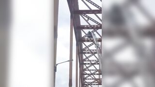 Adrenaline Junkie gets Stuck at Top of Bridge..despite Efforts to Save Him..He can't Hold On