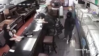 Hitman has Waitress Bag Up his Money before Executing Man at Diner Bar