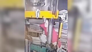 Female Factory Worker in China Accidentally Squishes her Arm