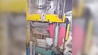 Female Factory Worker in China Accidentally Squishes her Arm