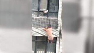 LOL: Lover hidden from husband nearly falls from balcony