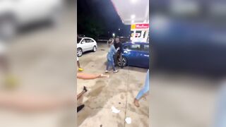 Brutal Girls Fight at Gas Station but a Guy gets Knocked Out from It All