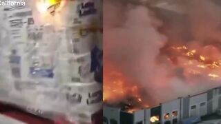 Americans are sick of everything! Chaos as an employee starts a massive fire inside a 1.2 million square foot warehouse filming himself on Instagram as he sets toilet paper packages ablaze