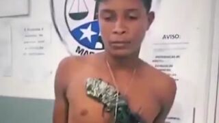Police Photographing Criminal caught with Over Sized Revolver