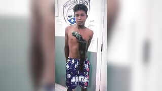 Police Photographing Criminal caught with Over Sized Revolver