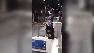 Migrant Hangs Girl Upside Down in Subway Stairwell