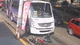 Motorcyclist Falls in Front of Bus...Takes his Time Getting out of the Way and he Finds Out