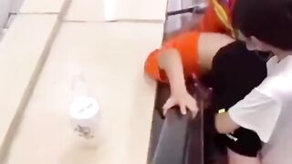 NO don't do that Kid. Poor guy sticks his Head in an Escalator