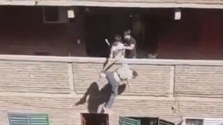 Residents evicted migrant squatters by throwing them from the balcony