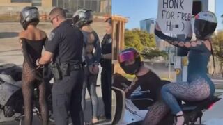 Two women arrested for reckless driving after waving a wild sign and desperately trying to get other drivers’ attention