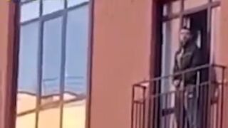 Sad: Man with Mental Problems Jumps from a Sixth floor with an Open Umbrella
