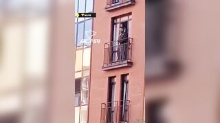 Sad: Man with Mental Problems Jumps from a Sixth floor with an Open Umbrella