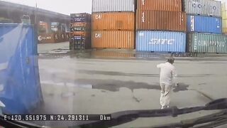 Man on Cell Phone in Heavy Work Area gets Swallowed under Forklift