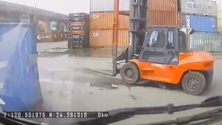 Man on Cell Phone in Heavy Work Area gets Swallowed under Forklift