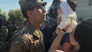 In a US Army graduation, soldiers cannot leave their place until a family member touches them, so this young woman brought her little daughter so she could be the one to touch her dad