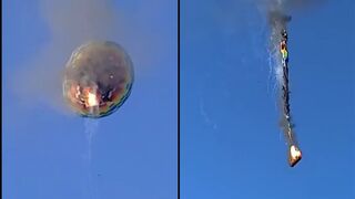 Hot air balloon carrying 21 people catches fire and crashes killing at least 8