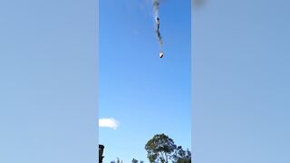 Hot air balloon carrying 21 people catches fire and crashes killing at least 8