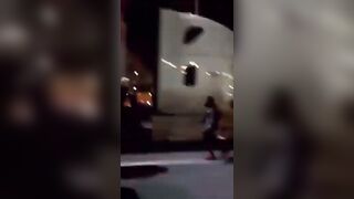 Looters Attack Fed-Ex Truck so he Drags one of them down the Highway under his Tire