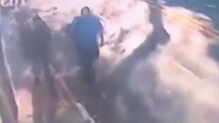 Sharp Guy in Blue, Dies Instantly from Sign, off of Building that Falls and lands on Him