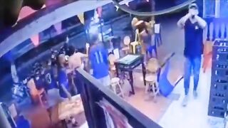 One Hitman in this Crowd Does his Job Effectively to the Man playing Dominos..WATCH