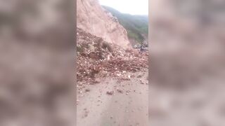 A Real Peruvian Witch tries Stopping a Land Slide....