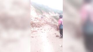 A Real Peruvian Witch tries Stopping a Land Slide....