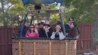 Man walks out to his backyard to find 13 people in a hot air balloon basket looking back at him in California