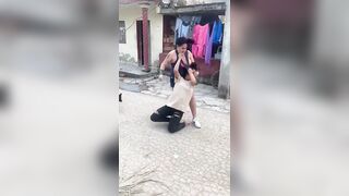 Bad ass woman savagely beating female neighbor