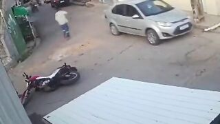 Motorcycle thief gets a Helmet to the Head...Wait for It