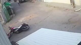 Motorcycle thief gets a Helmet to the Head...Wait for It